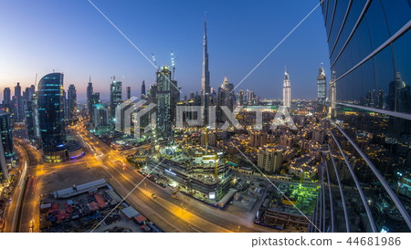 Dobai Downtown day to night timelapse. Aerial view over big futuristic city by night. 44681986