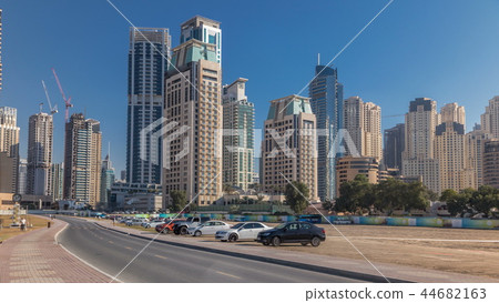 Scenic view of Dubai Marina Skyscrapers with cars timelapse, Skyline, View from sea, United Arab Emirates 44682163
