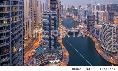 Beautiful aerial top view day to night transition timelapse of Dubai Marina canal Beautiful aerial top view day to night transition timelapse of Dubai Marina canal 44682275