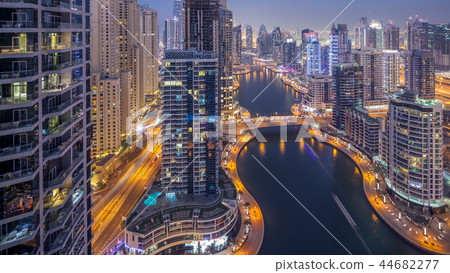 Beautiful aerial top view day to night transition timelapse of Dubai Marina canal Beautiful aerial top view day to night transition timelapse of Dubai Marina canal 44682277
