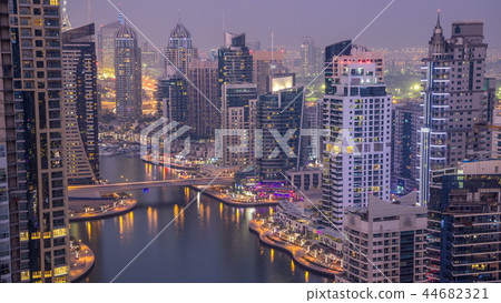 Beautiful aerial top view day to night transition timelapse of Dubai Marina canal Beautiful aerial top view day to night transition timelapse of Dubai Marina canal 44682321