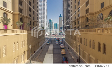 A view of traffic on the street at Jumeirah Beach Residence and Dubai marina timelapse, United Arab Emirates. 44682754
