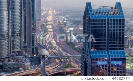 Dubai downtown skyline day to night timelapse and Sheikh Zayed road traffic, UAE Dubai downtown skyline day to night timelapse and Sheikh Zayed road traffic, UAE 44682774