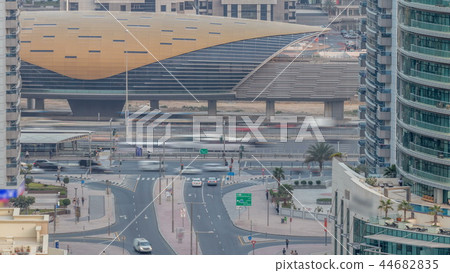 Beautiful aerial top view day to night transition timelapse of Dubai Marina canal 44682835