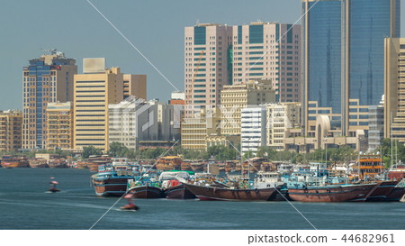 Trading wooden boats in the port timelapse. Merchant ships on the Creek Canal. Trading wooden boats in the port timelapse. Merchant ships on the Creek Canal. 44682961