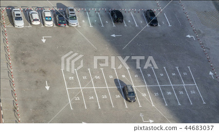 Top view of parking lot timelapse from rooftop of skyscraper 44683037