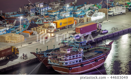 Loading a ship in Port Said night timelapse in Dubai, UAE. 44683049
