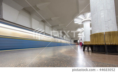 An underground train departing from Oleksievska metro station on Oleksievska Line of Kharkiv metro timelapse hyperlapse 44683052