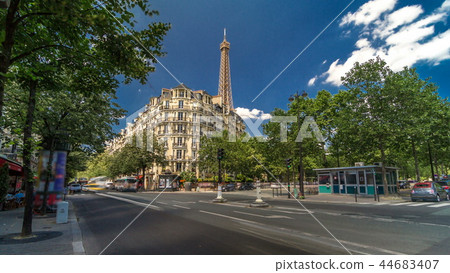 Eiffel Tower behind historic buildings in Paris timelapse hyperlapse, France Eiffel Tower behind historic buildings in Paris timelapse hyperlapse, France 44683407