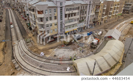 Concrete works for road maintenance construction with many workers and mixer timelapse Concrete works for road maintenance construction with many workers and mixer timelapse 44683454