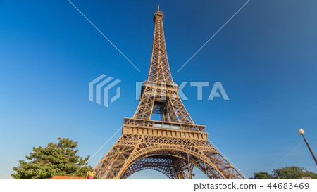 The Eiffel tower with warm light during sunset timelapse hyperlapse. The Eiffel tower with warm light during sunset timelapse hyperlapse. 44683469