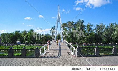 Pedestrian bridge across the river Kharkiv The Maryinsky Bridge and embankment timelapse Pedestrian bridge across the river Kharkiv The Maryinsky Bridge and embankment timelapse 44683484