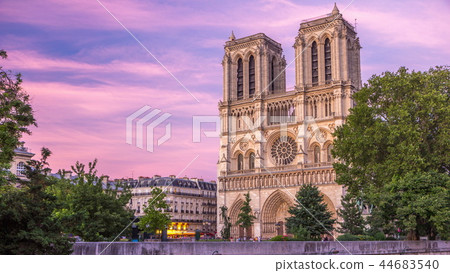 Front view of Notre Dame De Paris cathedral day to night timelapse after sunset. Front view of Notre Dame De Paris cathedral day to night timelapse after sunset. 44683540
