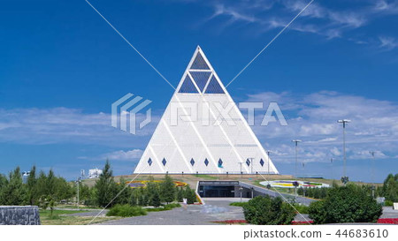 Exterior of the Palace of Peace and Reconciliation building timelapse hyperlapse in Astana, Kazakhstan. 44683610