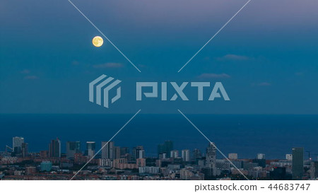 View of Barcelona skyline timelapse, the Mediterranean sea and buildings from Bunkers Carmel. Catalonia, Spain. View of Barcelona skyline timelapse, the Mediterranean sea and buildings from Bunkers Carmel. Catalonia, Spain. 44683747