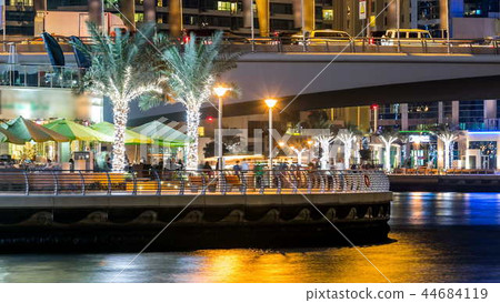 Promenade in Dubai Marina timelapse at night, UAE. 44684119