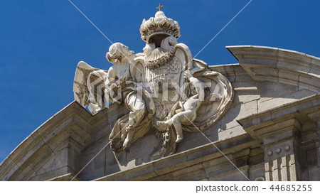Sculpture on the top of The Puerta de Alcala timelapse hyperlapse is a Neo-classical monument in the Plaza de la Independencia in Madrid, Spain. 44685255