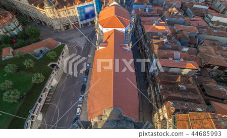Red roofs of city centre and Clerigos church - view from Clerigos Tower in Porto timelapse, Portugal Red roofs of city centre and Clerigos church - view from Clerigos Tower in Porto timelapse, Portugal 44685993