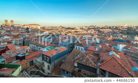 Sunset time, shadow cover Douro riverside with the Dom Luiz bridge timelapse, Porto , Portugal. Travel background Sunset time, shadow cover Douro riverside with the Dom Luiz bridge timelapse, Porto , Portugal. Travel background 44686150