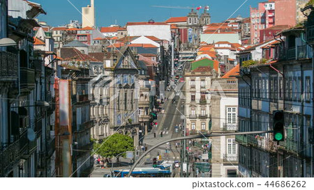 View of the Almeida Garret Square with the Sao Bento railway station and Congregados Church timelapse. 44686262