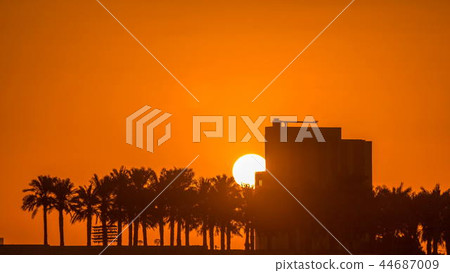 Sunrise from Al Corniche waterfront timelapse in Doha 44687009