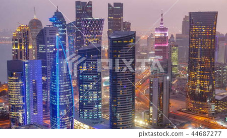 The skyline of the West Bay area from top in Doha day to night timelapse, Qatar. The skyline of the West Bay area from top in Doha day to night timelapse, Qatar. 44687277