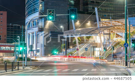 Traffic in Milan near modern skyscrapers in Porta Nuova business district night timelapse in Milan, Italy Traffic in Milan near modern skyscrapers in Porta Nuova business district night timelapse in Milan, Italy 44687505