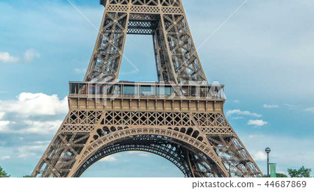 Close up view of first section of the Eiffel Tower timelapse in Paris, France. Close up view of first section of the Eiffel Tower timelapse in Paris, France. 44687869