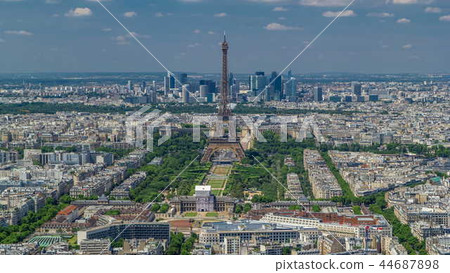 Aerial view from Montparnasse tower with Eiffel tower and La Defense district on background timelapse in Paris, France. 44687898