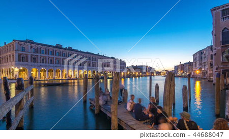 View of the deserted Rialto Market day to night timelapse after sunset, Venice, Italy viewed from pier across the Grand Canal View of the deserted Rialto Market day to night timelapse after sunset, Venice, Italy viewed from pier across the Grand Canal 44688047