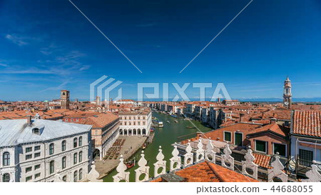 Top view on central busy canal in Venice timelapse, on both sides masterpieces of Venetian architecture Top view on central busy canal in Venice timelapse, on both sides masterpieces of Venetian architecture 44688055