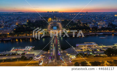 Aerial view over Trocadero day to night timelapse with the Palais de Chaillot seen from the Eiffel Tower in Paris, France. Aerial view over Trocadero day to night timelapse with the Palais de Chaillot seen from the Eiffel Tower in Paris, France. 44688117