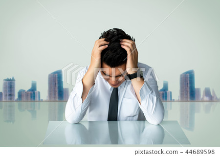 Asian business man sad sitting or strait business 44689598