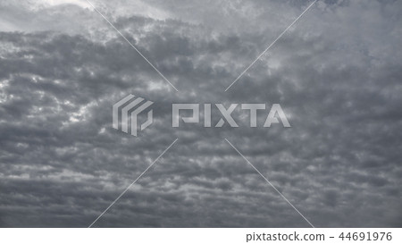 Background of gray cloudy sky bottom view, pattern 44691976