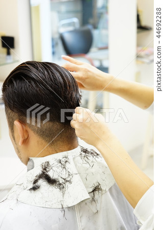 Beauty salon scene Men's cut image perming stock photos 44692288