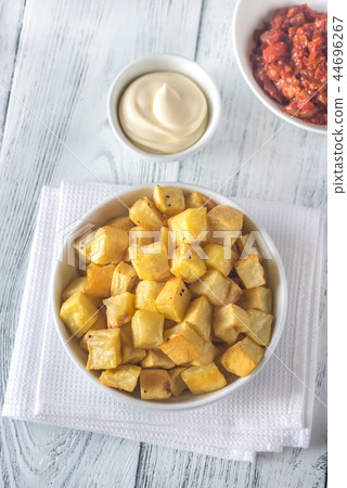 Portion of patatas bravas with sauces 44696267