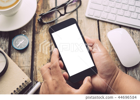businessman working on smart phone  44696584