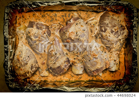 Uncooked Chicken , Chicken Legs, Oven Sauce, top view Uncooked Chicken , Chicken Legs, Oven Sauce, top view 44698024