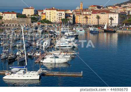 Ajaccio port. Coastal cityscape with yachts Ajaccio port. Coastal cityscape with yachts 44698670