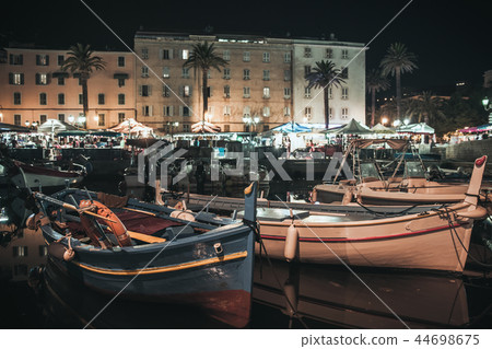 Fishing boat moored in Ajaccio port at night Fishing boat moored in Ajaccio port at night 44698675