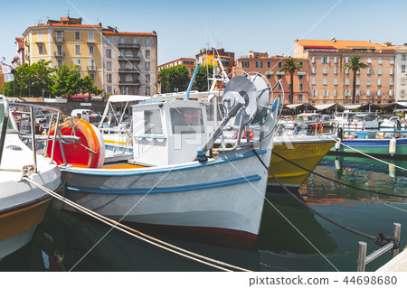 Vintage fishing boats moored in Ajaccio Vintage fishing boats moored in Ajaccio 44698680