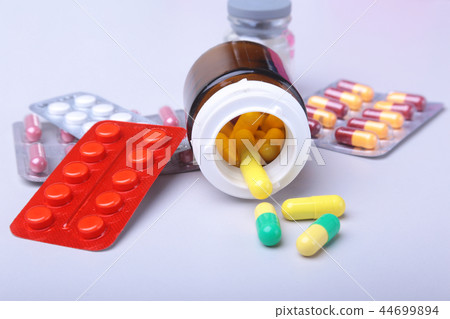 Colored Pills, Tablets, Capsules Blisters and red heart for Pharmacy and Medicine. Colored Pills, Tablets, Capsules Blisters and red heart for Pharmacy and Medicine. 44699894
