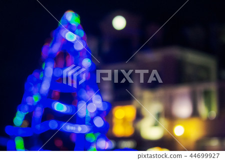 abstract blurry image of a blue Christmas tree abstract blurry image of a blue Christmas tree 44699927