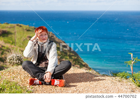 Happy smiling redhead women on Gozo, Malta. Happy smiling redhead women on Gozo, Malta. 44700702
