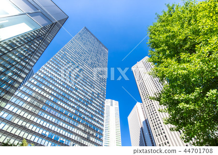 Landscape of the office town looking up at a skyscraper Landscape of the office town looking up at a skyscraper 44701708