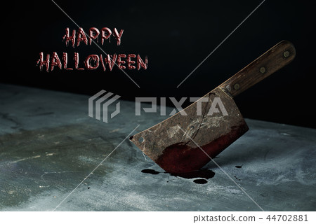cleaver full of blood and text happy Halloween cleaver full of blood and text happy Halloween 44702881