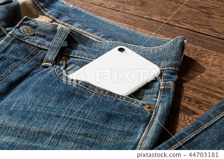 Smartphone and jeans Smartphone and jeans 44703181