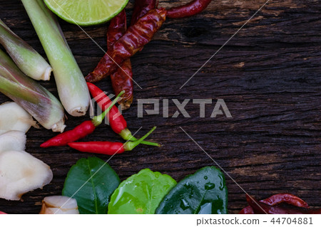 Thai food ingredient for Tom yum on old wooden. 44704881