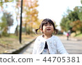 Autumn leaves girl walk 44705381
