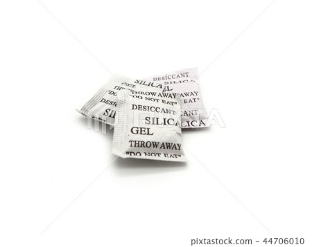 Silica gel packets isolated on a white background. Silica gel packets isolated on a white background. 44706010